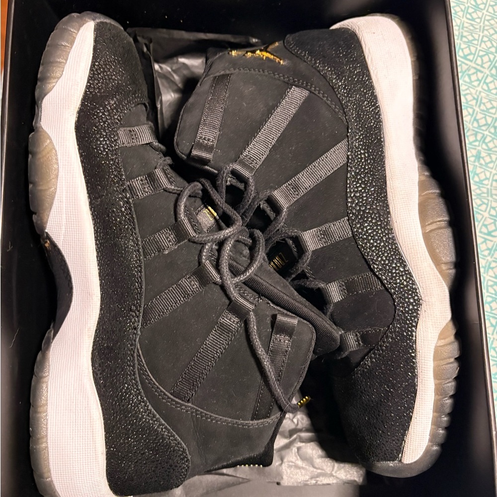 Jordan 11 Retro Prem HC in Black and Metallic Gold